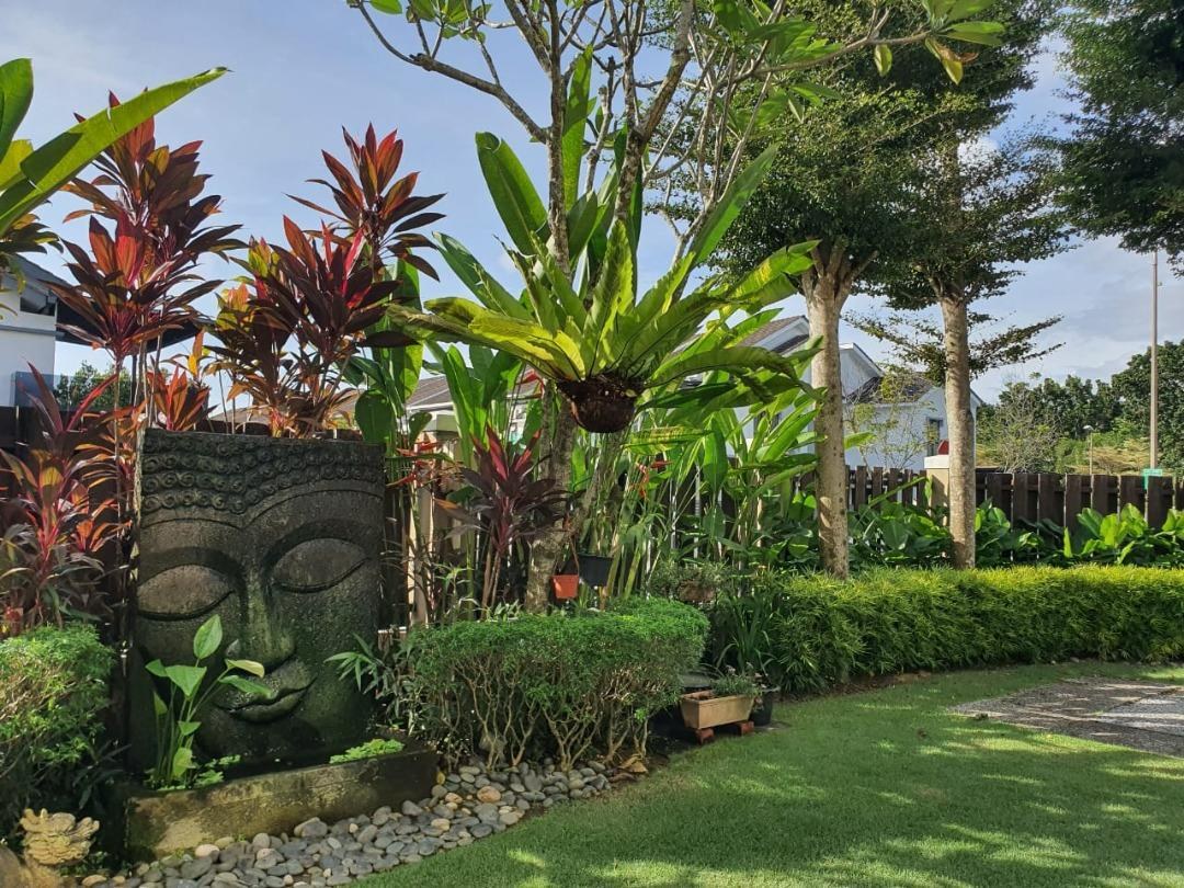 Established tropical landscaping in the home's private garden